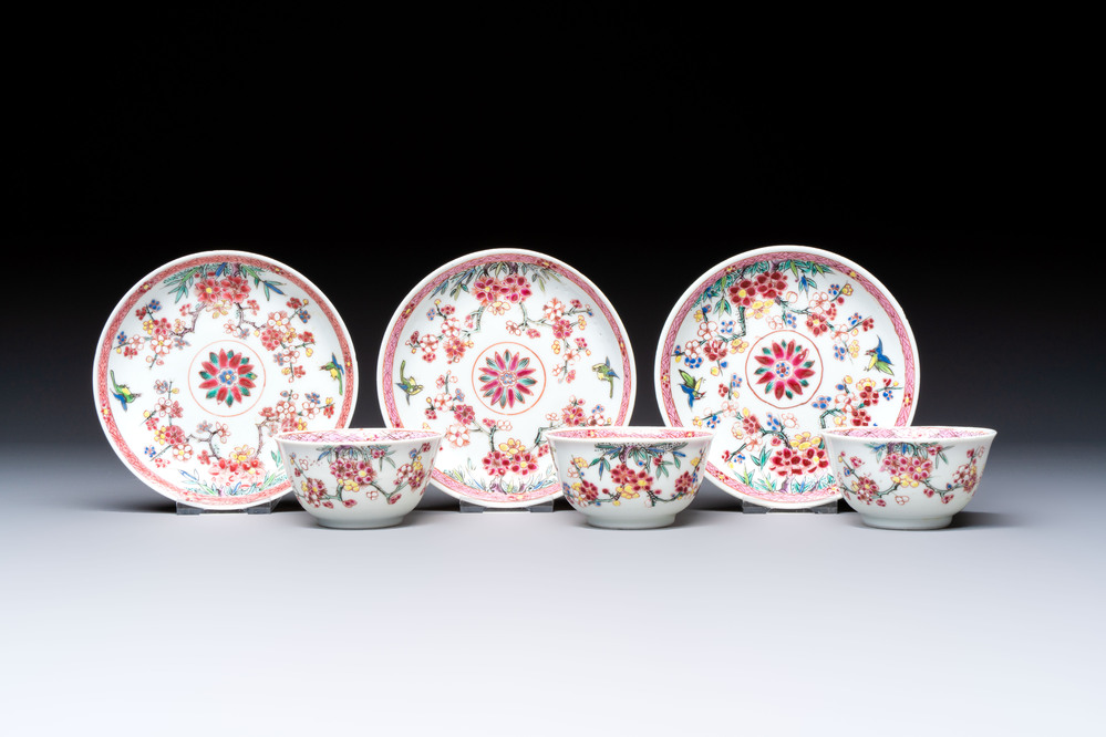 Three Chinese famille rose 'Birds and Plum Trees' cups and saucers, Yongzheng