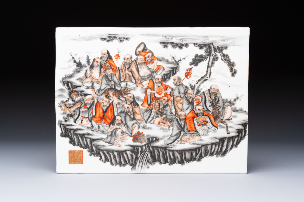 A Chinese grisaille and iron-red decorated '18 Luohan' plaque, Qianlong mark, 20th C.