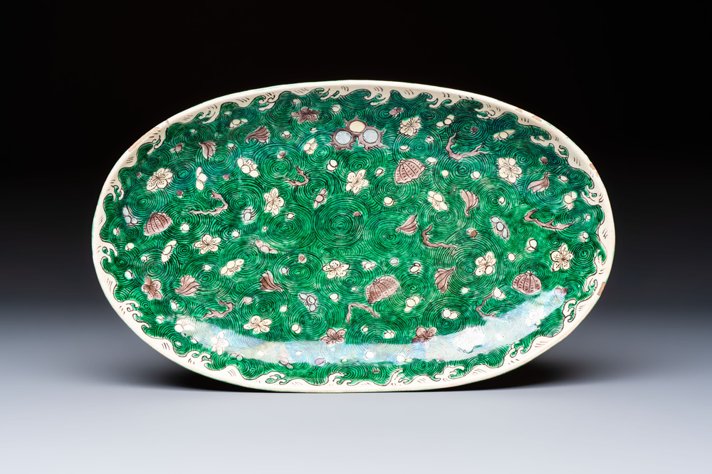 A Chinese verte biscuit oval dish, 19/20th C.