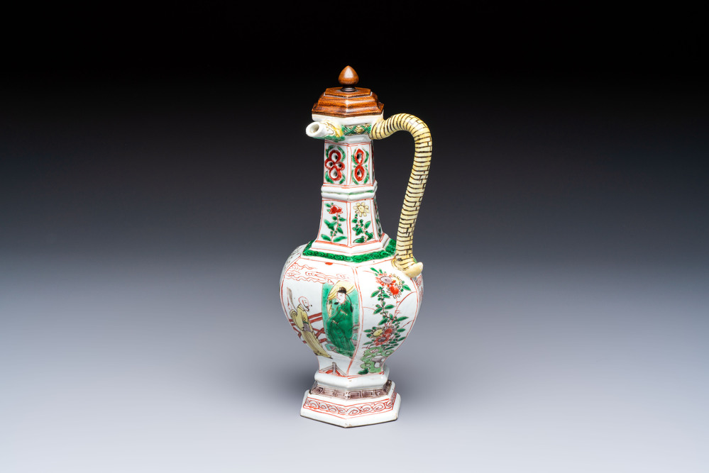 A rare Chinese famille verte puzzle jug with a wooden cover, Kangxi