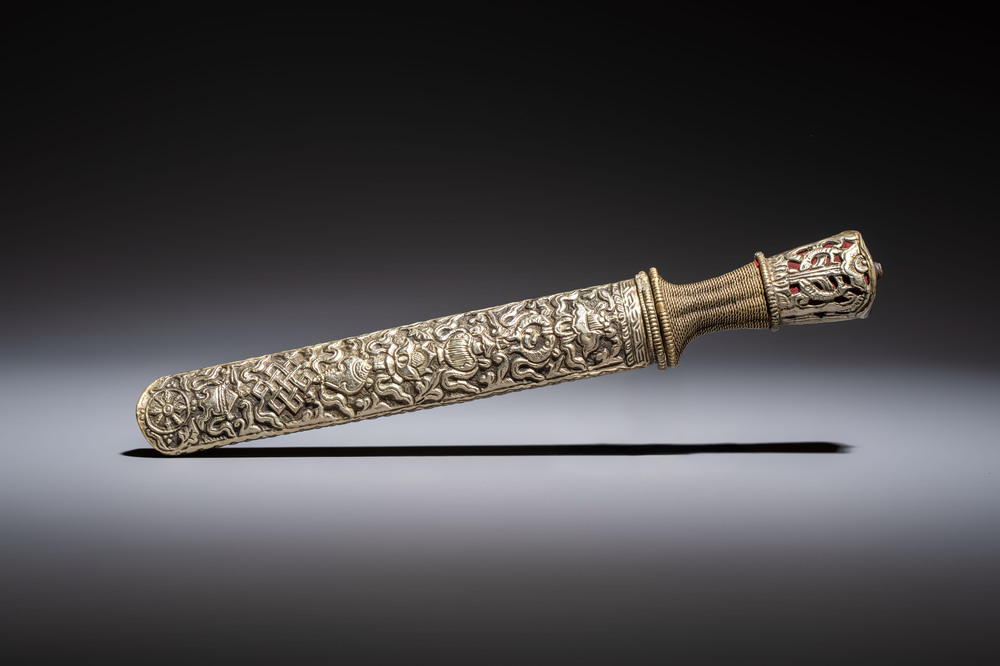 A Tibetan white metal 'Buddhist Symbols' dagger and scabbard, first half 20th C.