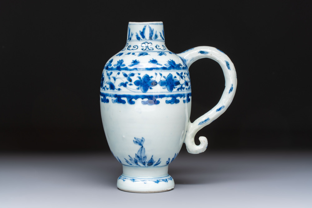A Chinese blue and white 'Floral' jug, Transitional period