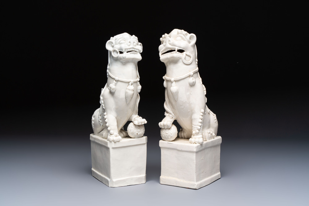 A pair of large Chinese Dehua blanc de Chine buddhist lion joss stick holders, 19th C.