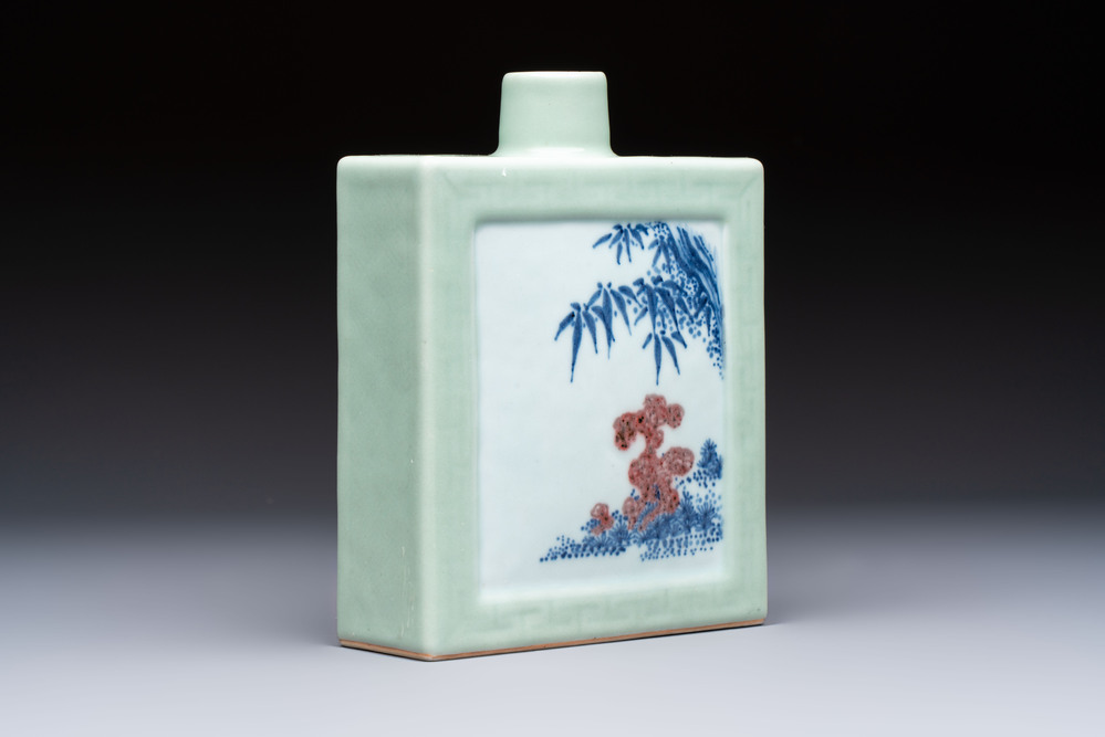 A Chinese blue, white and copper-red celadon-ground tea caddy with floral and bamboo design, Qianlong mark and of the period