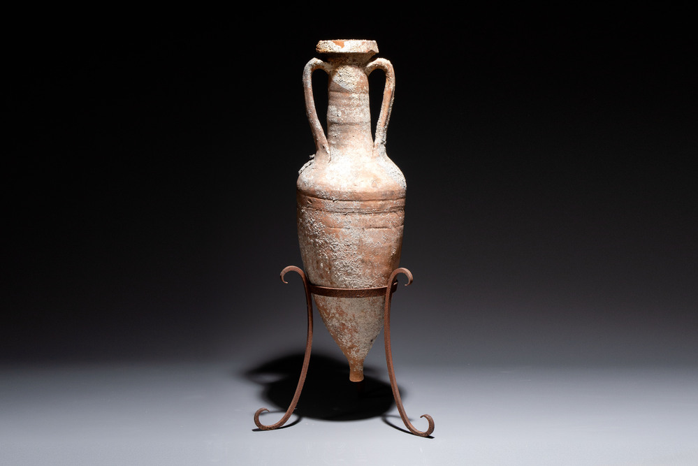 A Roman pottery wine transport amphora with marine encrustation, 2nd C. B.C./1st C.