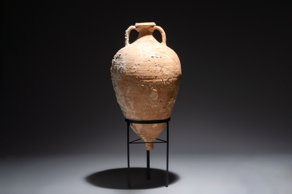 A Roman pottery olive oil transport amphora with marine encrustation, South of Spain, 1st/3rd C.