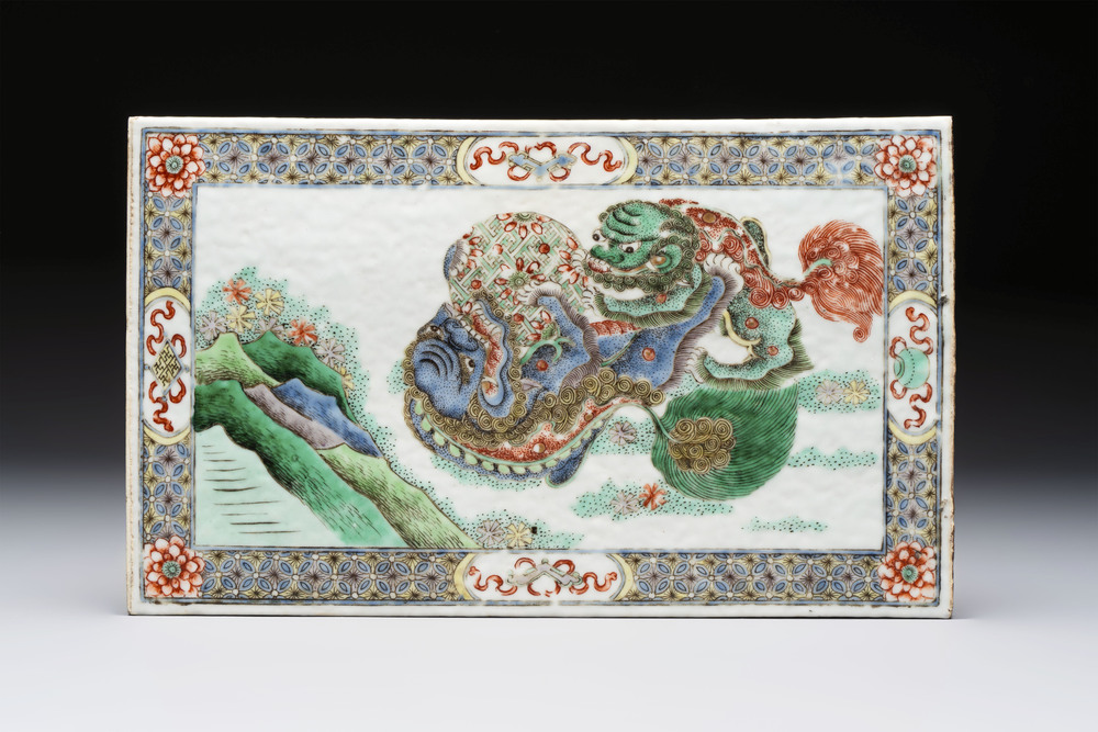 A Chinese famille verte 'Buddhist Lions' plaque, 19th C.