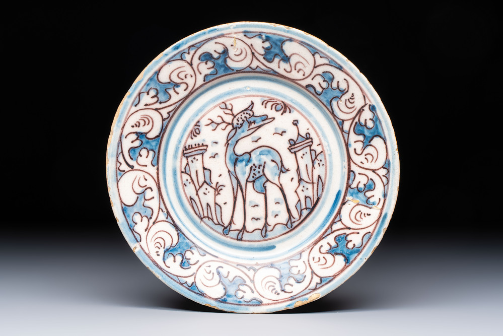 A blue, white and manganese Portuguese 'Deer' plate, 17th C.
