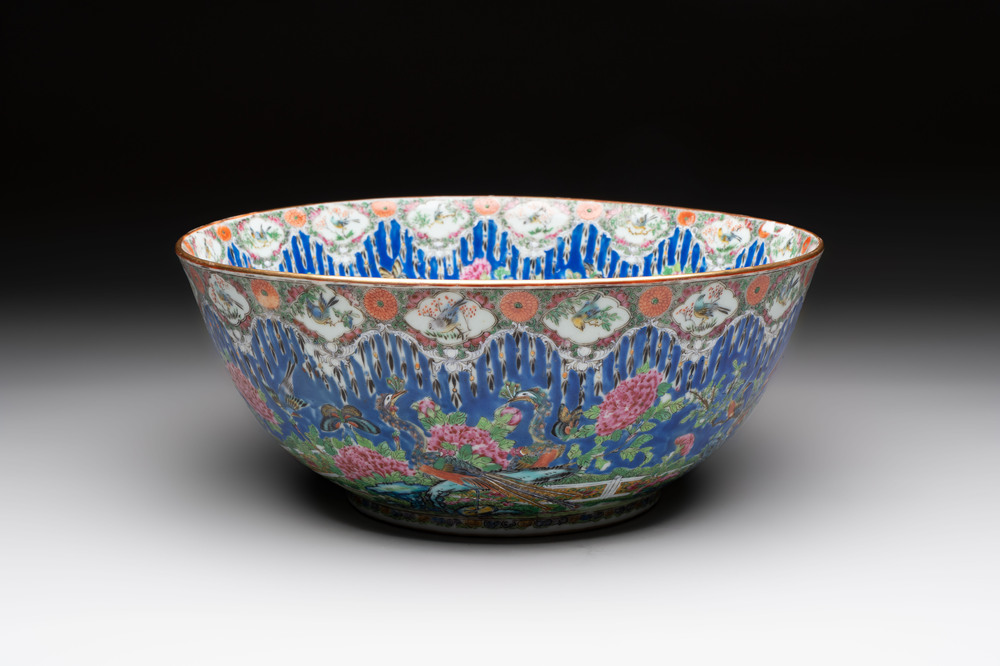 A Chinese Canton famille rose 'peacock' punch bowl, 19th C.