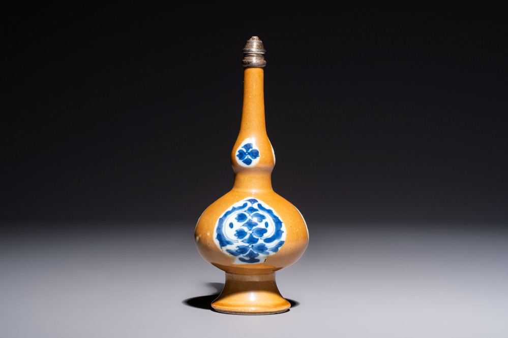 A Chinese blue and white capucine-ground rosewater sprinkler with silver mount, Kangxi