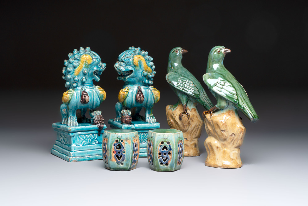 A pair of Chinese turquoise-glazed Buddhist lions, a pair of green-glazed parrots and a pair of miniature garden seats, 19/20th C.