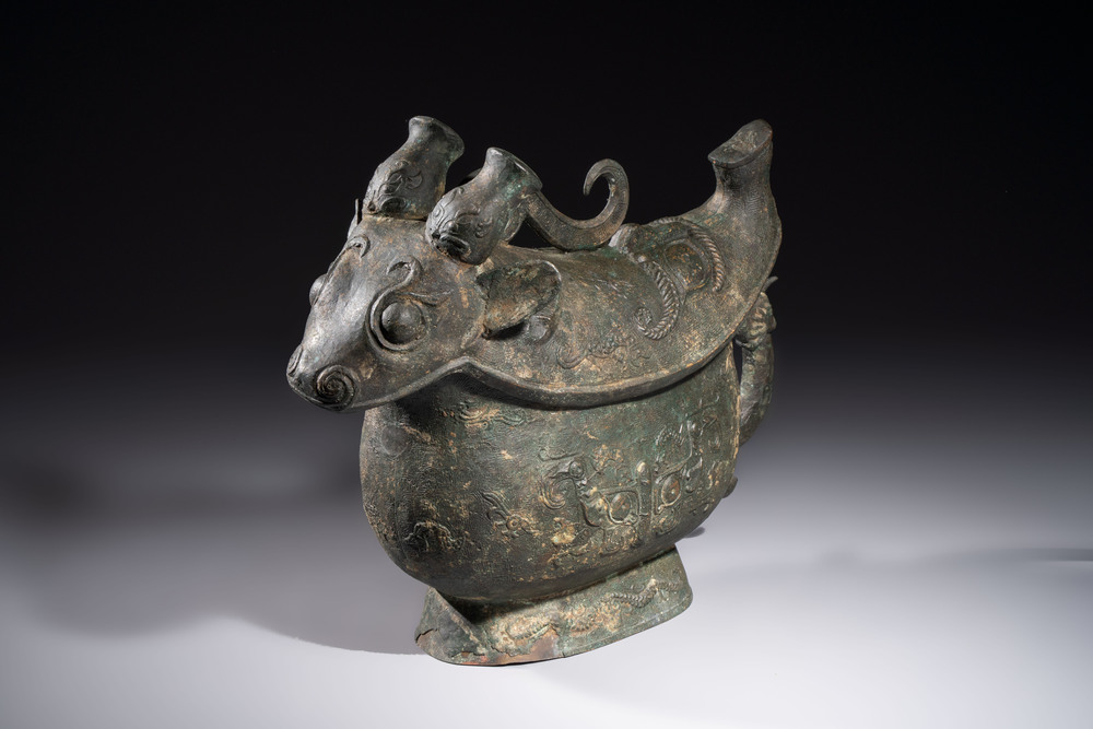 A rare and large Chinese archaistic bronze pouring vessel and cover, Gong 觥, Qing