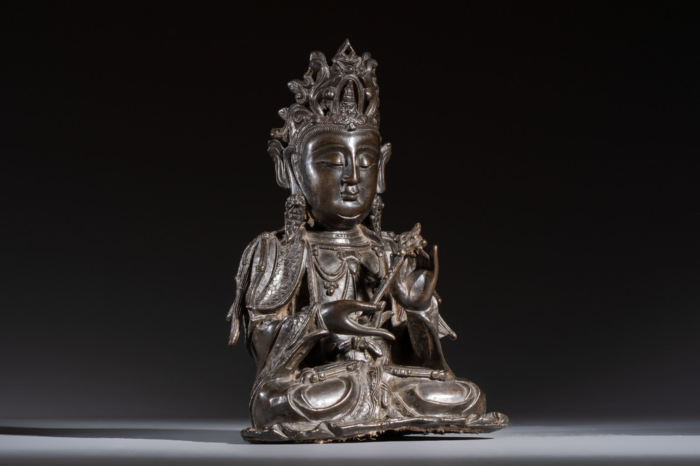 A fine Chinese bronze figure of Bodhisattva holding a ruyi, Ming