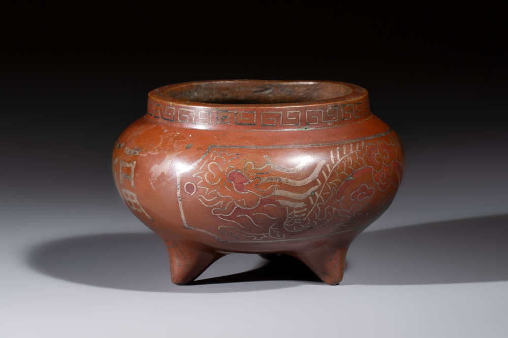 A Chinese or Vietnamese silver-inlaid bronze 'Fu Lu Shou' tripod censer,  Xuande mark, 19th C.