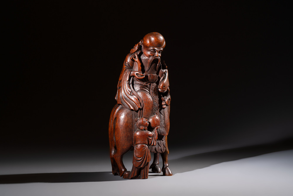 A large Chinese carved bamboo 'Shoulao' group, 19th C.
