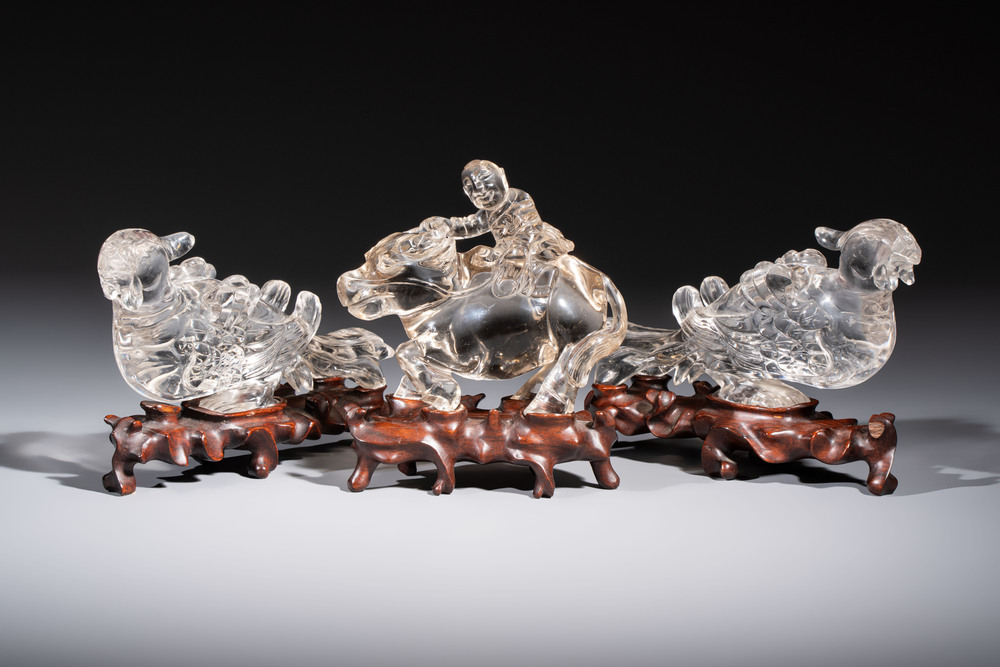 Three Chinese rock crystal sculptures on wooden stands, Republic