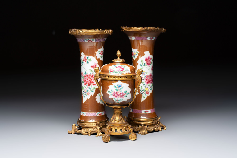 A pair of gilt-bronze-mounted Chinese famille rose capucine-ground vases and a covered bowl, Qianlong