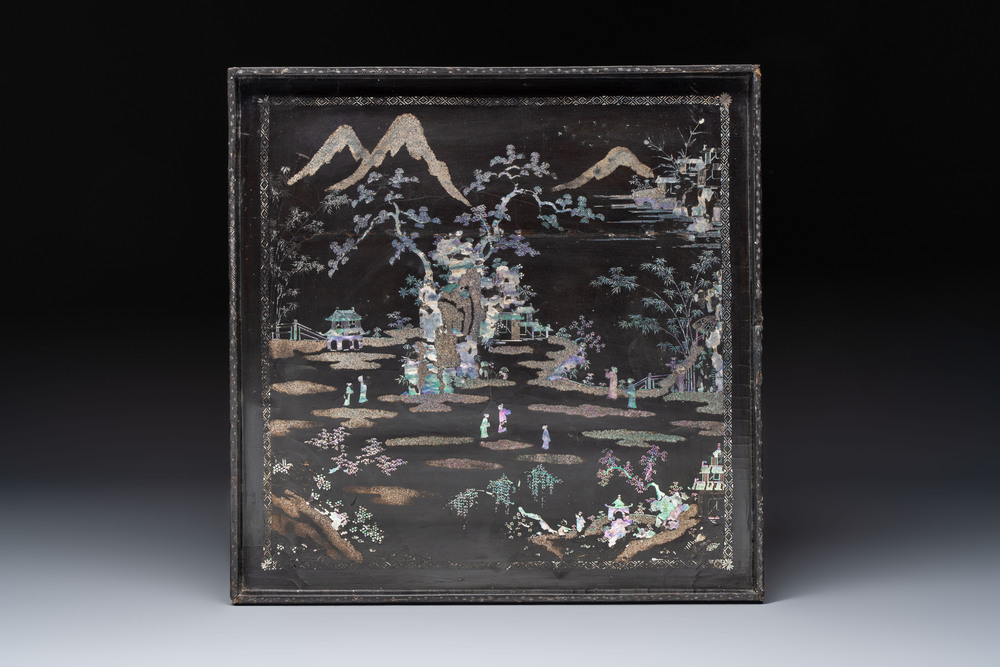 A rare large square Chinese laque burgaut&eacute; tray depicting a mountainous garden, Kangxi