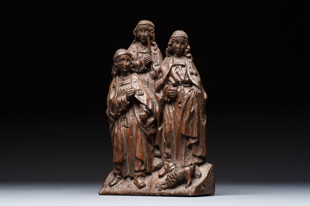 A Flemish carved oak group, 16th C.