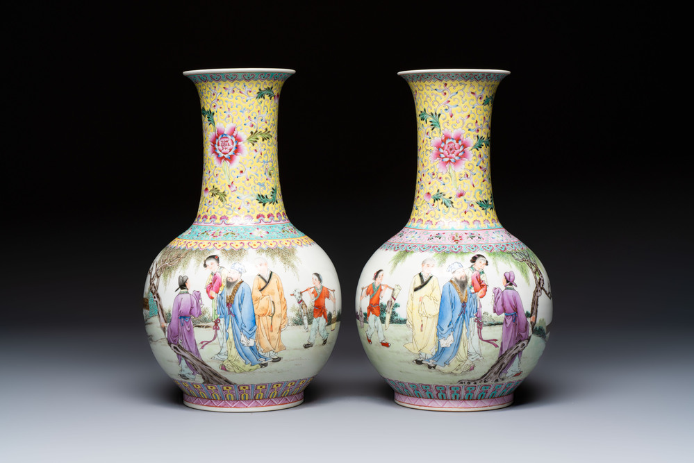 A pair of Chinese famille rose bottle vases, Qianlong mark, 20th C.