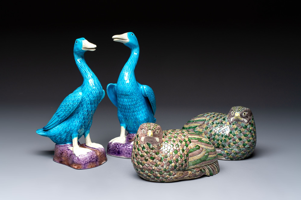 A pair of Chinese turquoise-glazed ducks and a pair of verte biscuit quail-form covered boxes, 20th C.