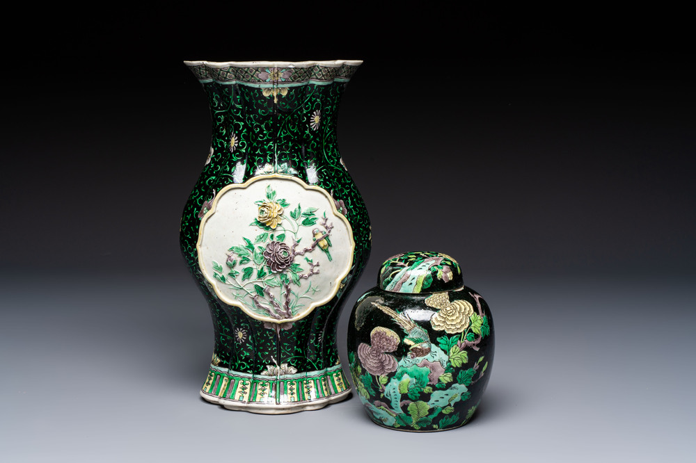A Chinese verte biscuit black-ground vase and a covered jar, Xuande and Kangxi mark, 19th C.