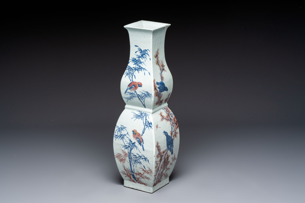 A Chinese blue, white and copper-red 'Birds among Flowering Branches' square gourd vase, 19th C.