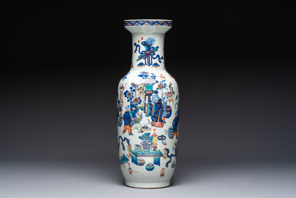 A Chinese doucai and famille rose rouleau vase with figures among antiquities, 19th C.