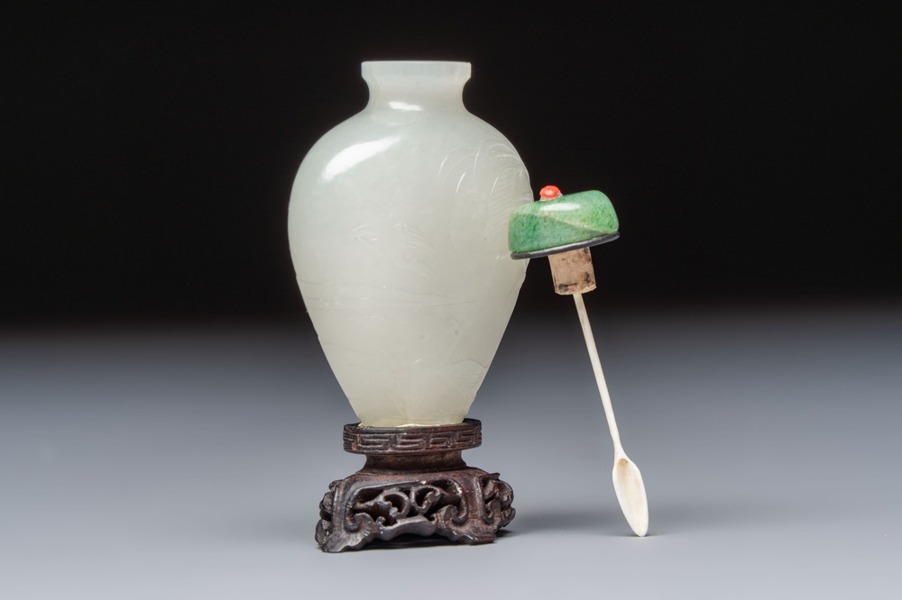 A Chinese carved white jade 'Geese' snuff bottle with a wooden stand, 18/19th C.