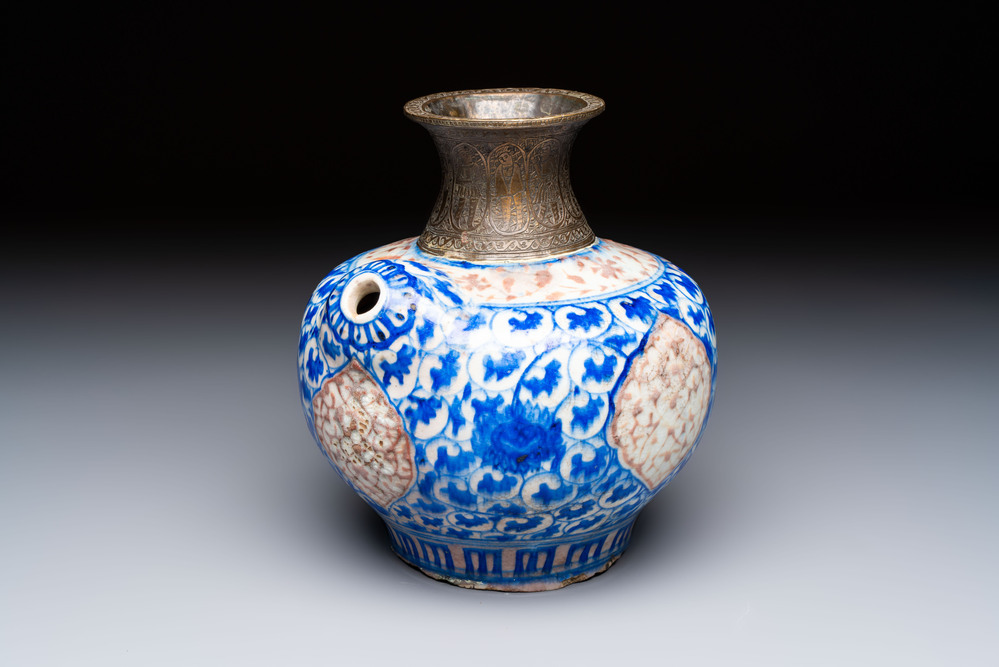 A Safavid blue, white and red pottery hookah base or kendi, Kirman, Persia, 17th C.