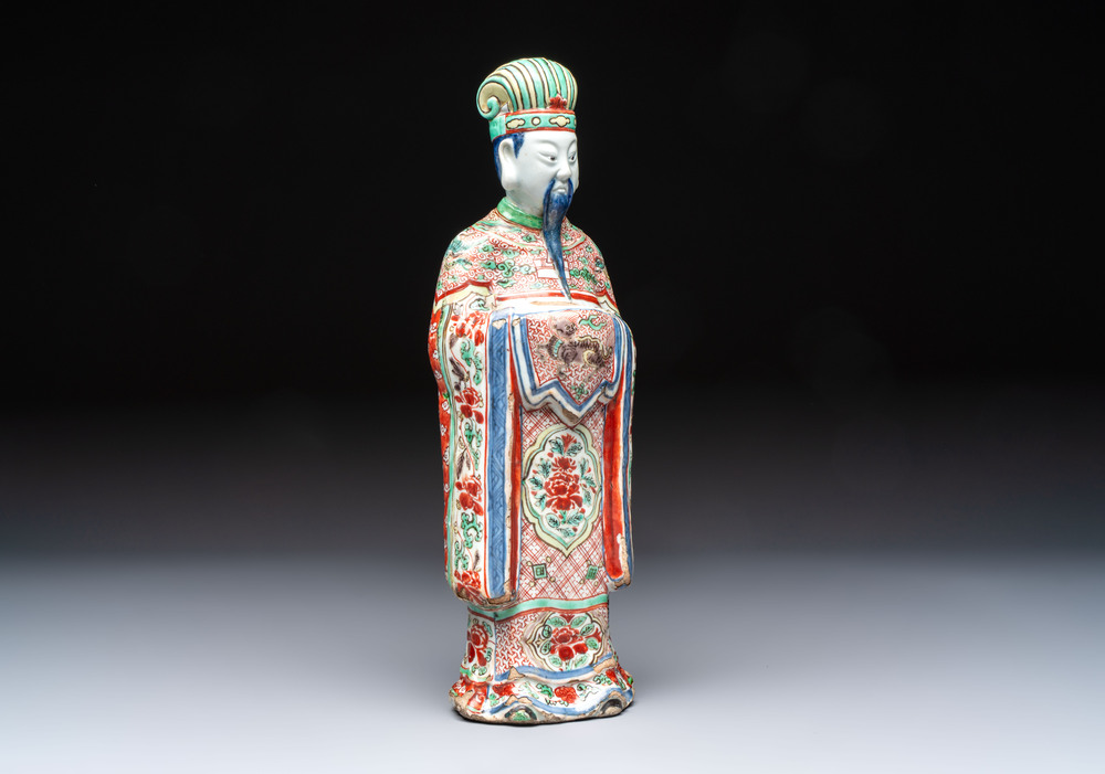 A rare Chinese wucai figure of a dignitary, late Ming/Transitional period