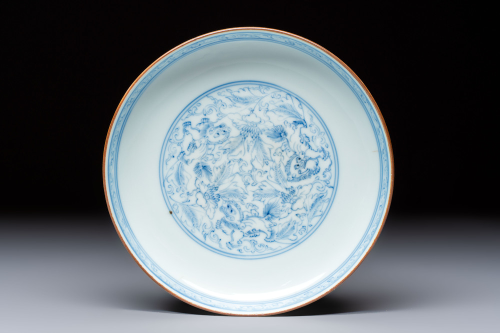 A Chinese blue and white pencil-style 'Buddhist Lions' plate, Chenghua mark, Shunzhi/Kangxi