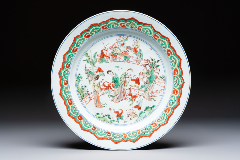 A Chinese famille verte 'Elegant Ladies and Playing Boys' dish, Chenghua mark, Kangxi