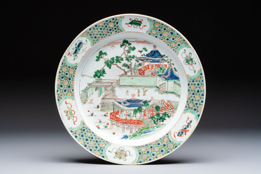 A Chinese famille verte 'Pavilions and Lotus Pond' dish, swastika mark, Kangxi