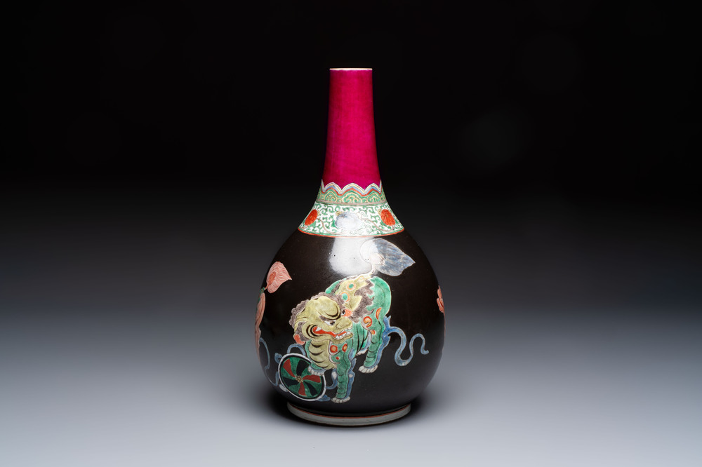A rare Chinese famille verte black- and ruby-ground 'Buddhist Lions' vase, Kangxi
