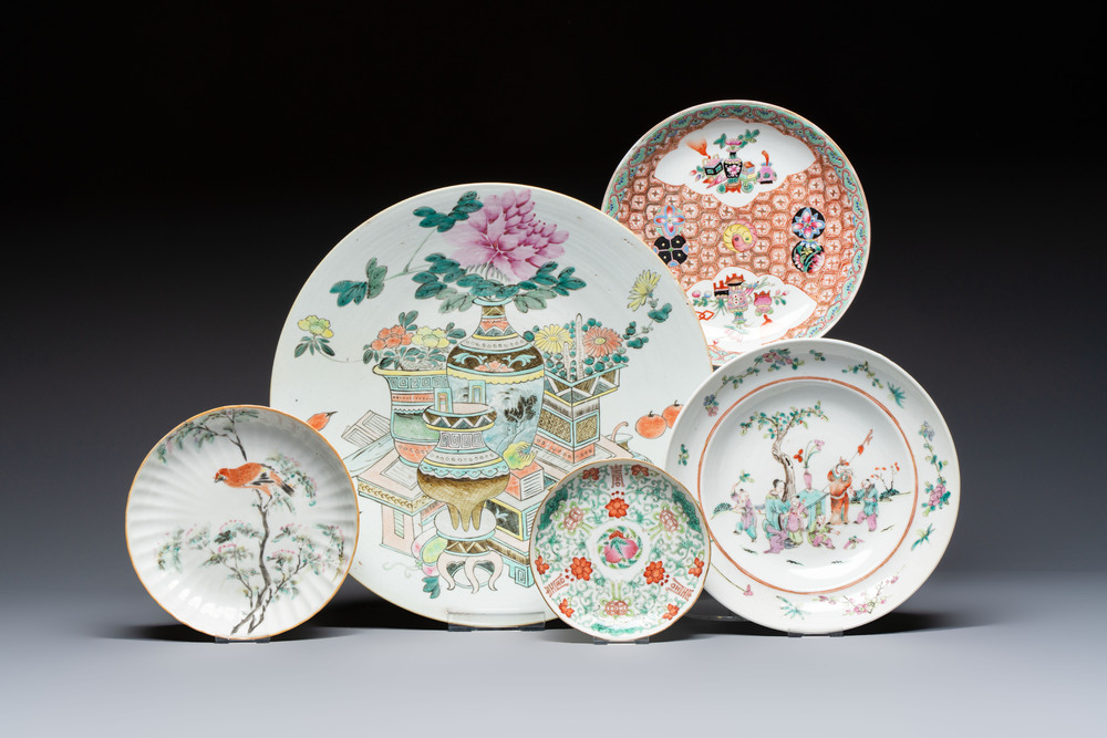 A Chinese qianjiang cai dish and a plate, two famille rose plates and a saucer, Chenghua, Yongzheng and Guangxu marks, 19th C.
