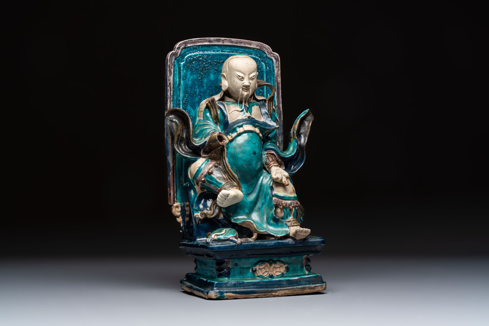 A Chinese fahua-glazed biscuit figure of Zhenwu, Ming