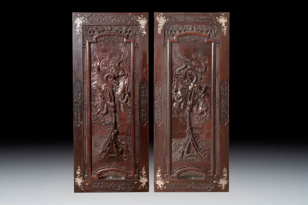 A pair of Vietnamese mother-of-pearl-inlaid hardwood 'Dragon and Carps' panels, 19th C.