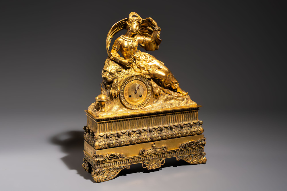 A gilt-bronze 'Oriental Beauty Reclining on a Lion Skin' mantel clock, France, first quarter 19th C.