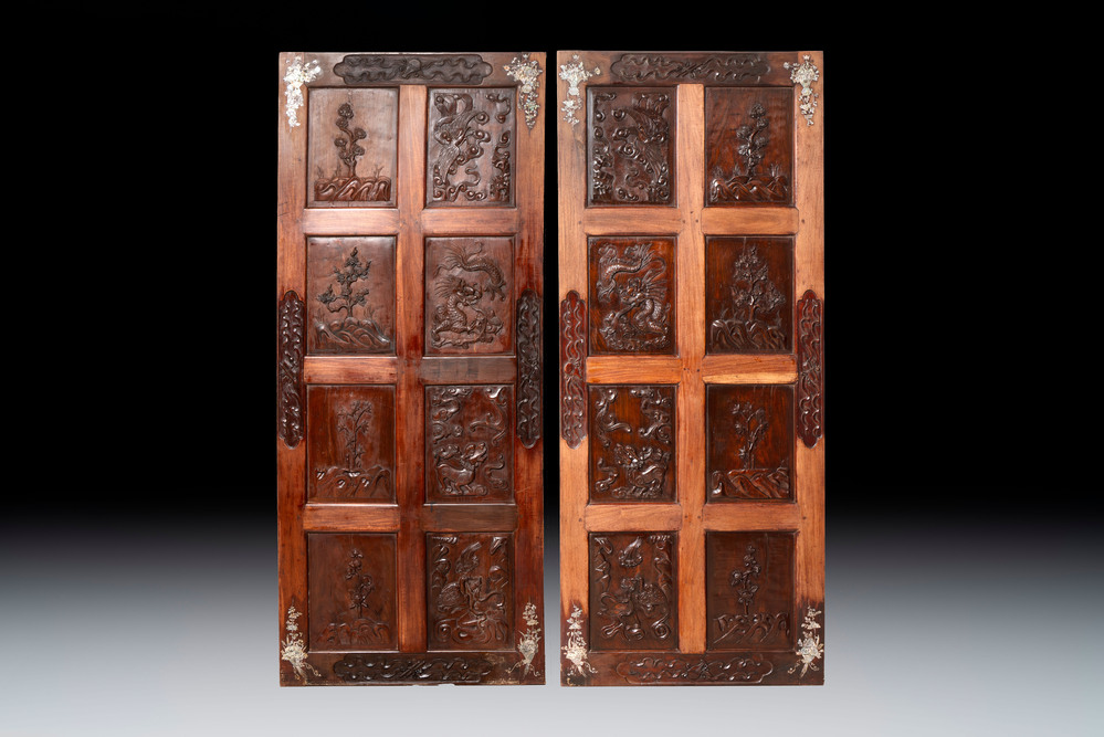 A pair of Vietnamese mother-of-pearl-inlaid hardwood 'Four Symbols' panels, 19th C.