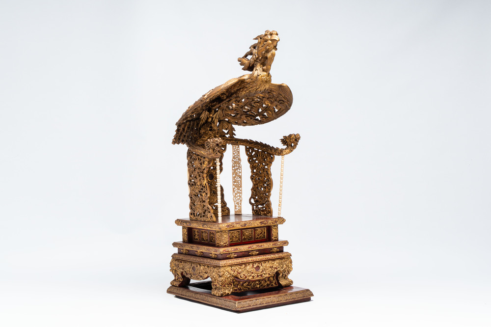An exceptional Vietnamese gilt-lacquered wood and ivory 'Dragon and Phoenix' throne-shaped altar, 18/19th C.