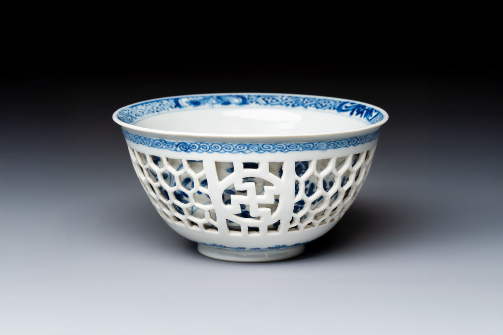 A Chinese blue and white reticulated double-walled 'Swastika' bowl, Kangxi