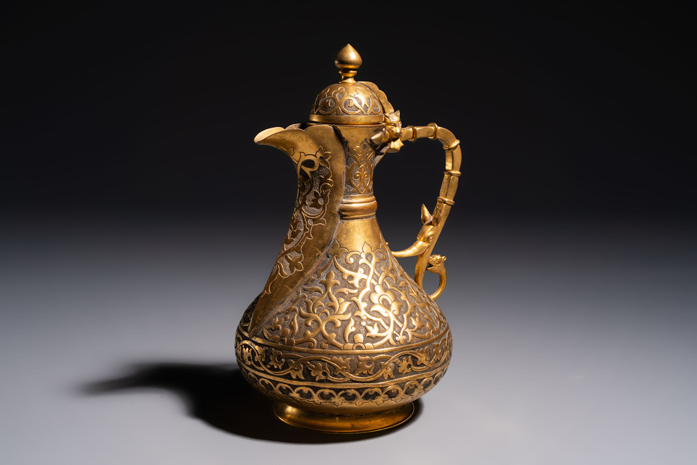 An Ottoman gilt-metal jug with stylised floral design, 19/20th C.