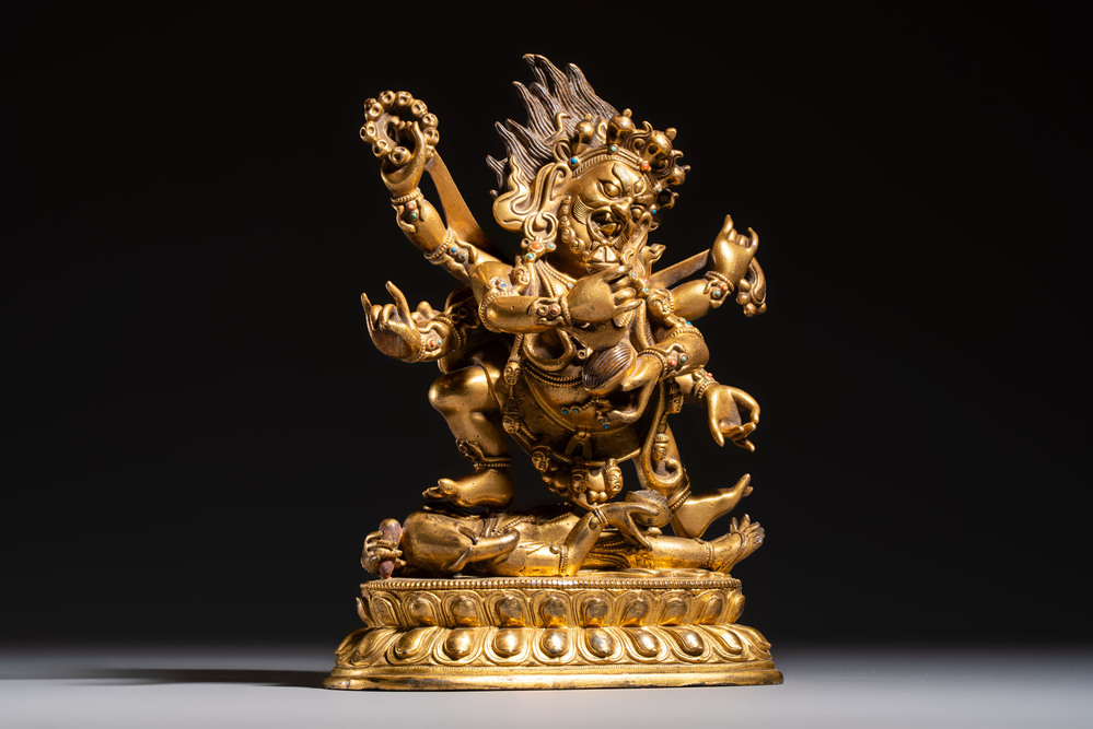 A fine Sino-Tibetan gilt-bronze figure of Mahakala, 18th C.