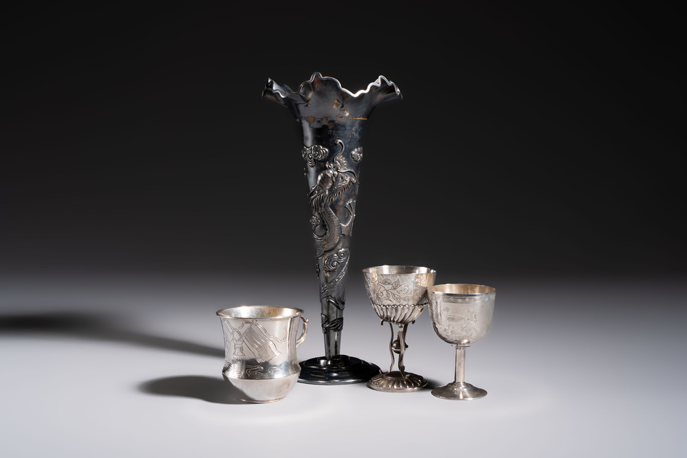 A Chinese silver 'Dragon' vase, two stem cups and a handled cup, various marks, 19/20th C.