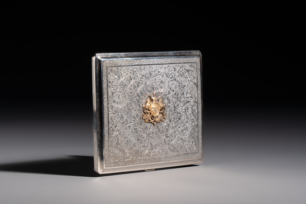 An Iranian silver and gilt cigarette case commemorating Mohammad Reza Pahlavi's coronation, 20th C.