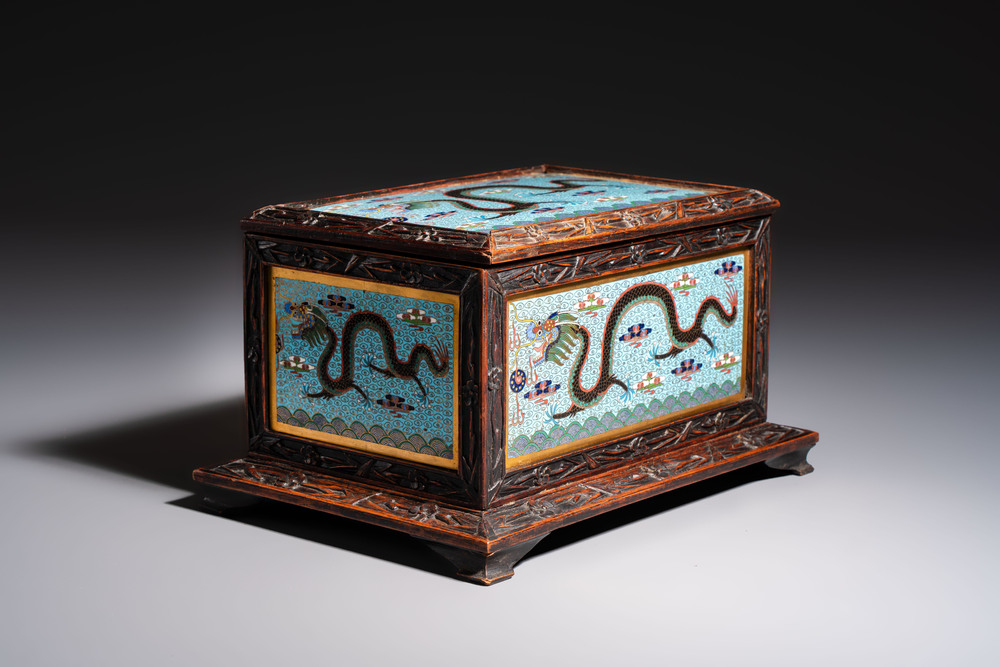 A Chinese wooden 'Dragon' casket mounted with cloisonn&eacute; plaques, 19/20th C.