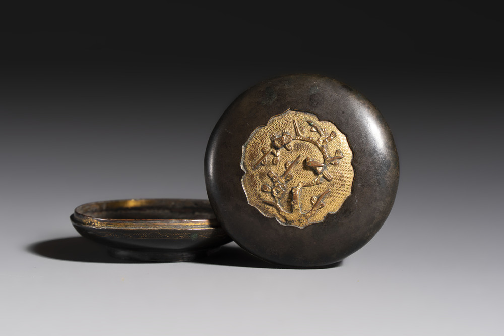 A fine Chinese parcel-gilt bronze 'Bird Among Blossoming Plum Branches' box and cover, 18th C.