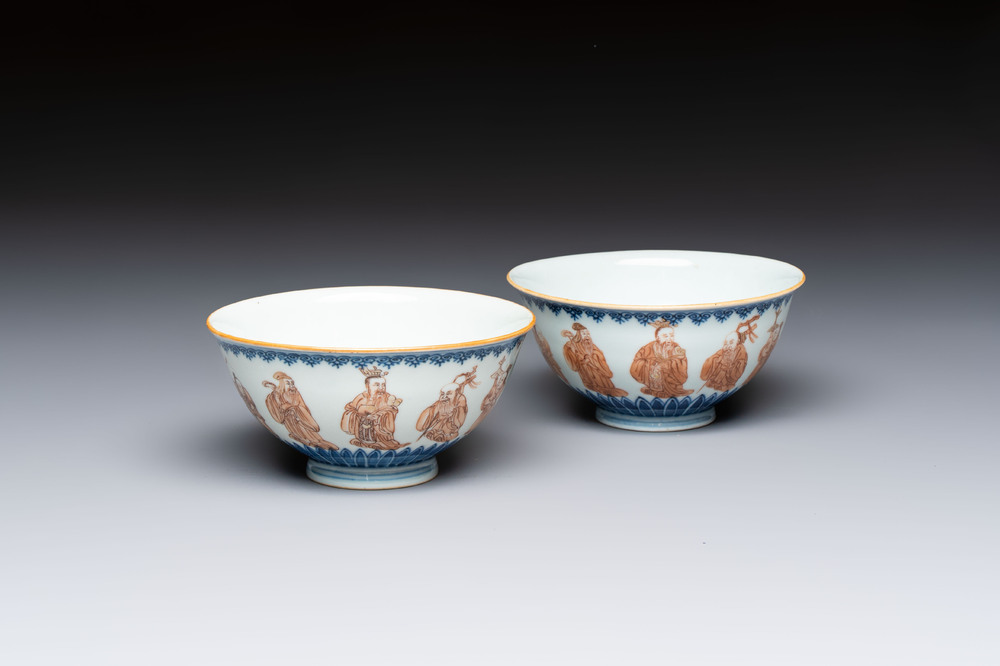 A pair of Chinese blue and white iron-red-decorated 'Three Star Gods' bowls, Qianlong mark and of the period