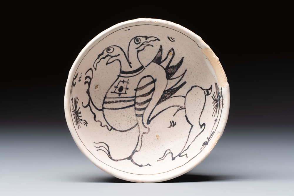 An unusual early Italian maiolica bowl with a two-headed mythical bird, 15th C.